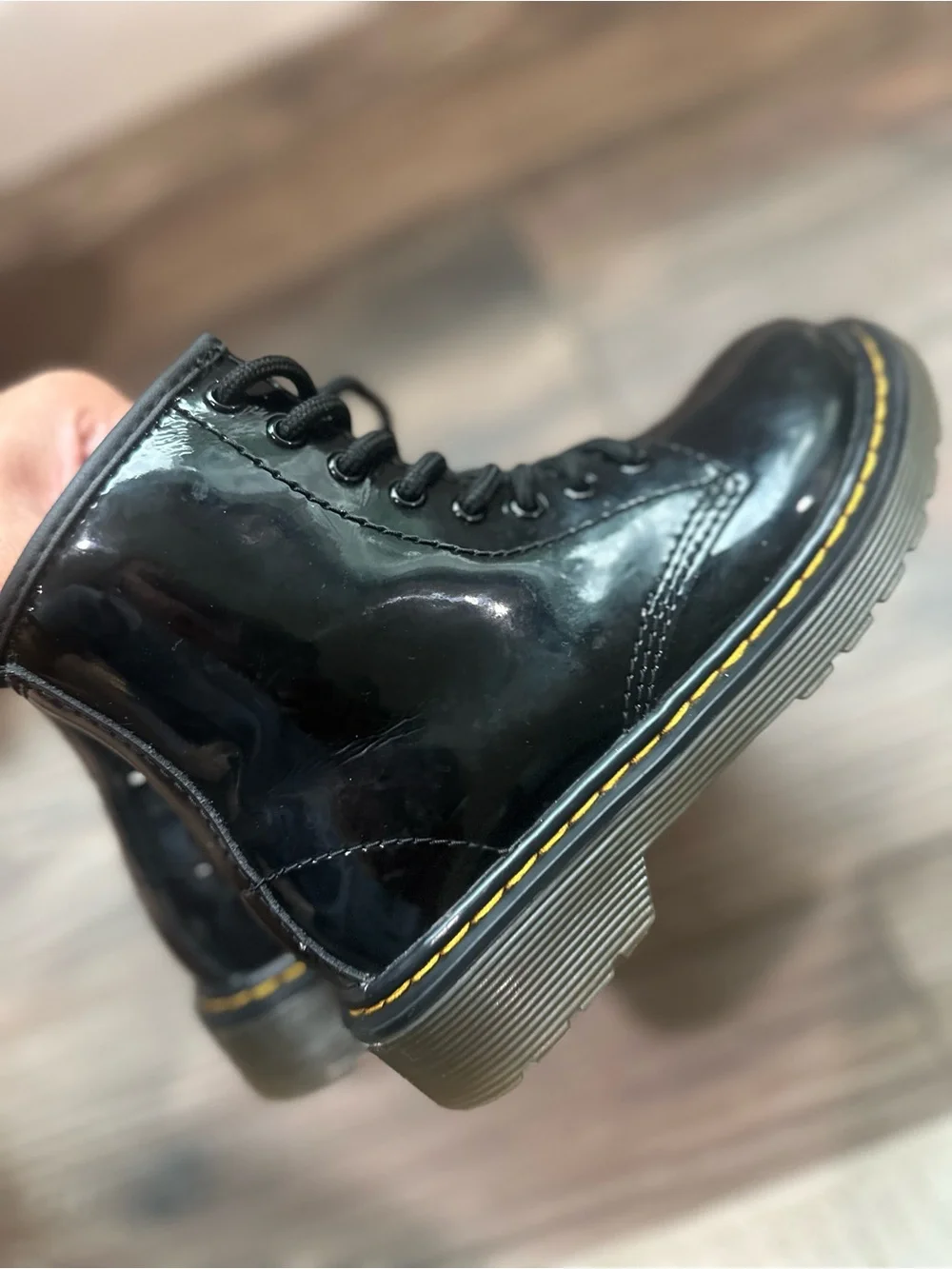 Dr. Martens Kids Black Patent Lace-Up Combat Boots with Yellow Heel Loop